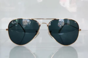 Golden frame black lenses